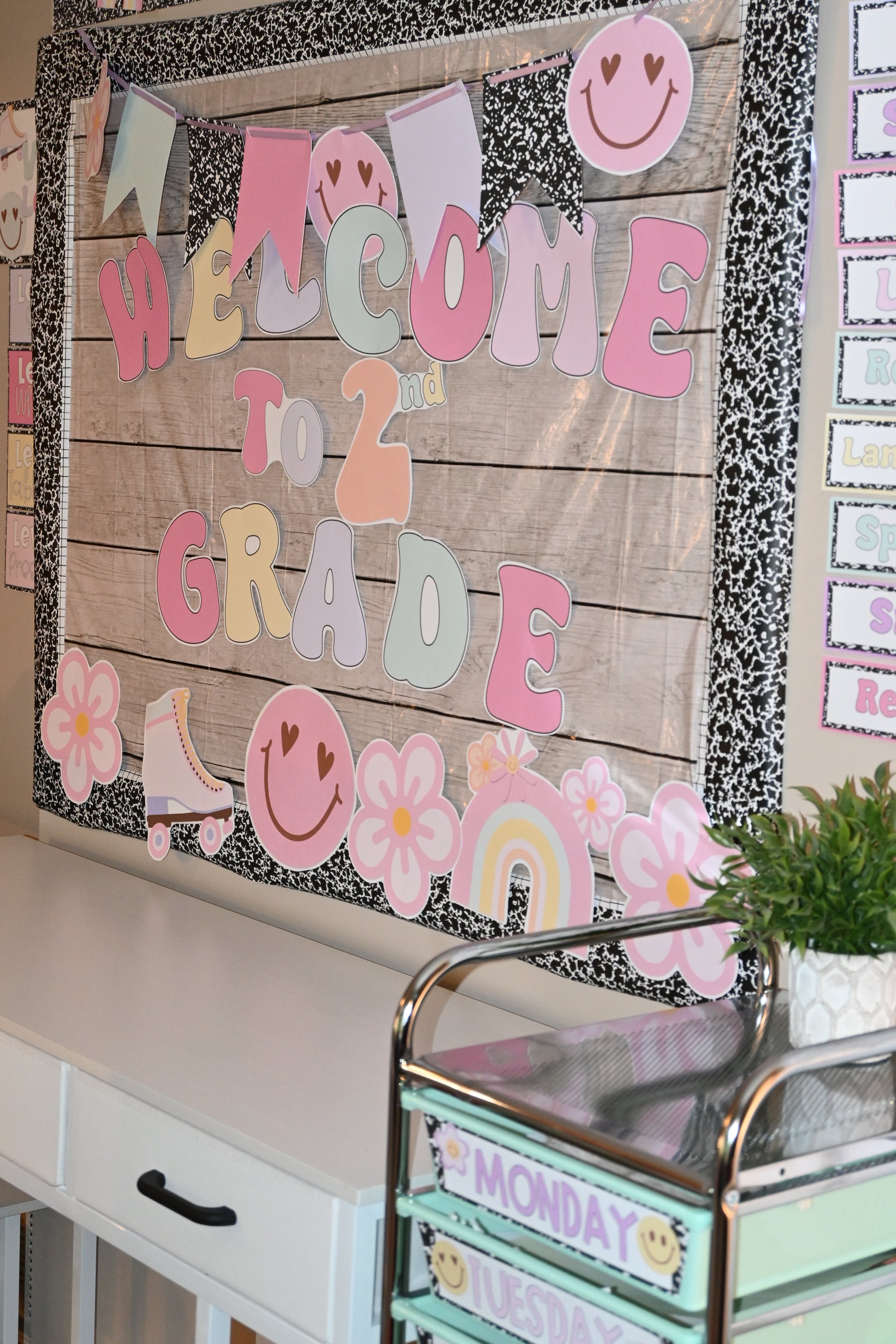 Decorative mat with colorful letters spelling 'Welcome' on a wooden surface.